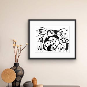 May include: A framed black and white abstract art print. The artwork features curved lines and square shapes on a grid. The print is displayed above a black cabinet with decorative vases and a woven plate.