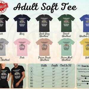 May include: Adult soft t-shirt with a graphic of a bear wearing a crown and the text "Jumping Queen of Awesome, I am Awesome, Together I am a Jumping Queen". The shirt is available in 10 colors: black, navy, dark grey, forest, blue, grey, pink, prism peach, prism mint, and yellow. The size chart shows the width, length, and chest to fit measurements in inches. The shirt is described as comfortable, soft, and flattering. It is available in sizes S to 4XL.