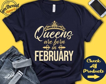May include: Navy blue t-shirt with a gold crown and the text "Queens are born in FEBRUARY".