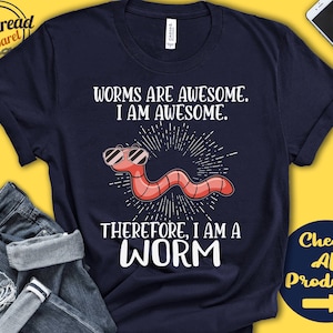 May include: A navy blue t-shirt with a worm wearing sunglasses and the text "Worms are awesome. I am awesome. Therefore, I am a worm."