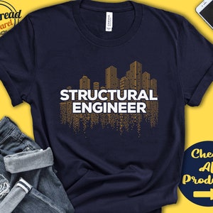 May include: A navy blue t-shirt with a gold city skyline graphic and the text "Structural Engineer".