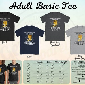 May include: Adult Basic Tee shirts in black, navy, dark grey, and grey. Each shirt features a graphic of a banana with a snake's head and the text "Banana Ball Pythons are awesome, I am awesome, therefore I am a Banana Ball Python."