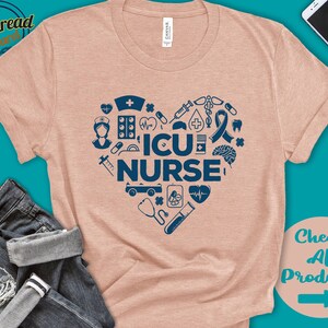 May include: A pink t-shirt with a blue heart design featuring medical symbols and the text "ICU NURSE".