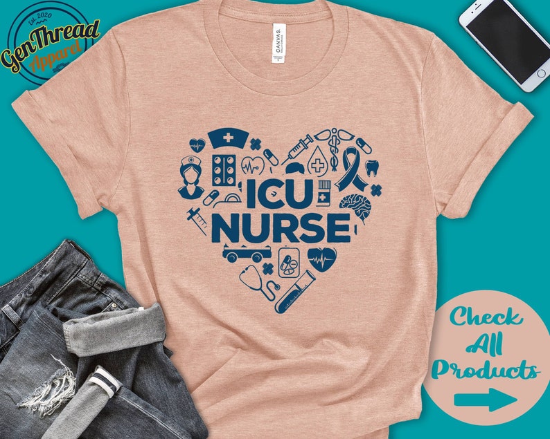 May include: A pink t-shirt with a blue heart design featuring medical symbols and the text "ICU NURSE".