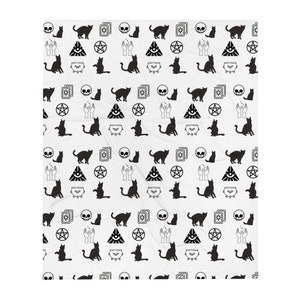 May include: Black and white repeating pattern featuring a black cat, a skull, a pentagram, a triangle with an eye, a cauldron, and two hands with fingers pointing up. The pattern is on a white background.