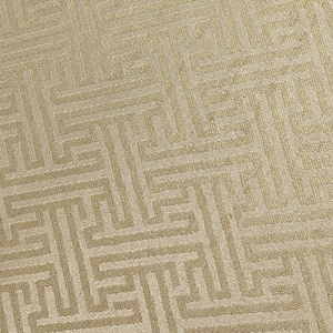 May include: A textured fabric featuring a repeating geometric maze pattern in a metallic gold hue. The design consists of interconnected lines and right-angled shapes that create a structured, symmetrical grid across the entire surface.