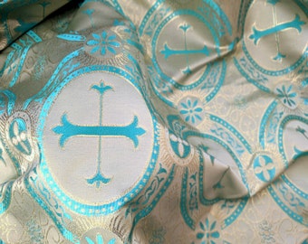 Tela de brocado metálico blanco dorado turquesa azul cortado a medida para vestimentas religiosas litúrgicas de 7" con medallón de cruz redonda, mantel para altar festivo