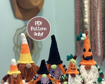 May include: A collection of handmade crochet gnomes in various Halloween and autumn-themed designs. The gnomes feature pointed hats, beards, and decorative details, including a pumpkin and candy corn. The image includes the text "PDF Pattern Only!"