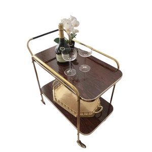 Vintage Mid-Century zweistöckiger Barwagen mit goldenen Akzenten und Holzimitat | Westdeutsches Design (1960er–1970er Jahre)