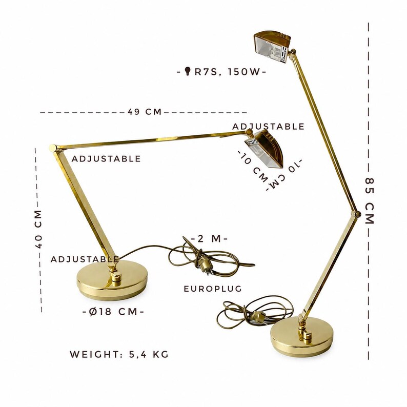 May include: A gold-toned adjustable desk lamp with a round base, measuring 18 cm in diameter. The lamp extends to 49 cm and is 85 cm tall. It features a 150W bulb and a 2-meter cord. The lamp weighs 5.4 kg.