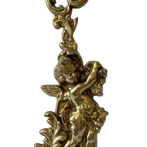 Early 20th-Century Brass Winged Cherub Doorstop with Cast Iron Base – Victorian Style  Decorative Door Porter