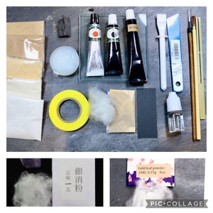 Könnte beinhalten: Eine Sammlung von Materialien zum Vergolden, darunter Blattgoldpulver, eine kleine Flasche Klebstoff, gelbes Abklebeband, ein kleines Stück Schleifpapier, eine weiße Watte, ein kleines Glas mit weißem Kleber, zwei Tuben mit schwarzer und roter Farbe, ein kleines Stück Holzkohle und zwei Pinsel.