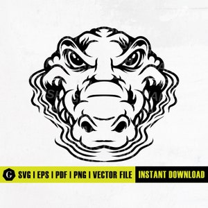 Puede incluir: Ilustración vectorial en blanco y negro de la cabeza de un caimán con una expresión feroz. La boca del caimán está abierta, revelando dientes afilados. La ilustración es adecuada para usar como logotipo, mascota o elemento de diseño gráfico.