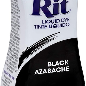 May include: A bottle of Rit Liquid Dye in black azabache color. The bottle is 8 fluid ounces (236 ml) and is labeled "All-Purpose Para Todo Propósito". The label also includes a warning that the dye is an eye irritant and contains salt.
