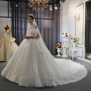 Princess ballgown wedding dress image 4