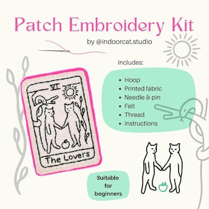 May include: Embroidery kit with a tarot card design showing two cats holding hands, labelled "The Lovers." The kit includes a hoop, printed fabric, needle, felt, thread, and instructions. Suitable for beginners.