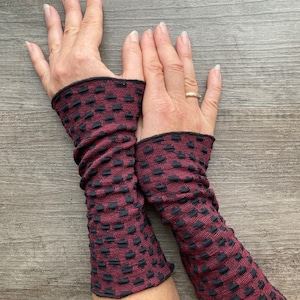 Elegant hand warmers, wrist warmers made of viscose cloque with spiral or rose patterns