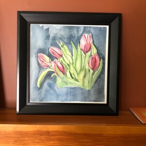 Aquarell rosa Tulpen in einem Rahmen