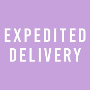 May include: White text on a lavender background reads "EXPEDITED DELIVERY". The text is in a bold, sans-serif font. The image is a simple graphic, suitable for use in e-commerce or promotional materials.