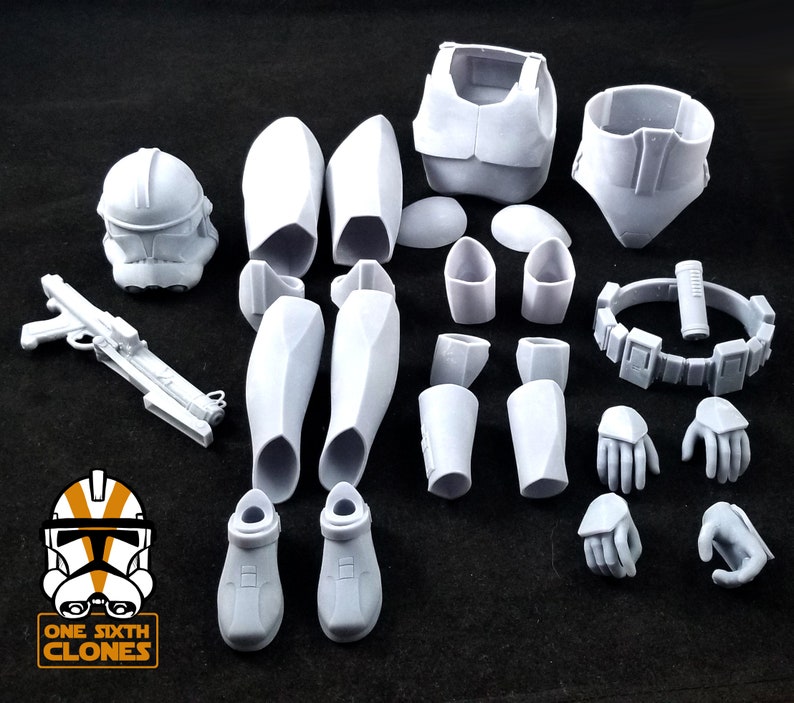 May include: A set of white plastic parts for a 1/6 scale action figure. The set includes a helmet, torso, arms, legs, hands, and a blaster. The parts are unpainted and ready to be assembled.