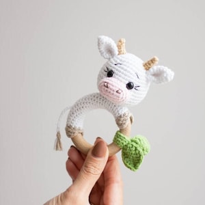 White crochet cow baby rattle as the part of the baby shower hamper, Personalized Christmas baby gift for first time mom, Symbol of  2021