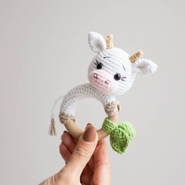 White crochet cow baby rattle as the part of the baby shower hamper, Personalized Christmas baby gift for first time mom, Symbol of  2021