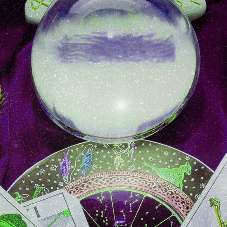 May include: A crystal ball with a cloudy interior rests on a decorative plate featuring zodiac symbols and tarot cards. The plate is green and purple, adorned with figures and constellations. The background is a deep purple.