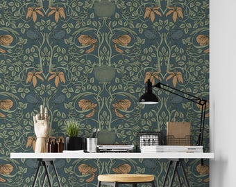May include: Wallpaper featuring a repeating botanical pattern with orange flowers, muted green leaves, and dark blue circular elements on a deep teal background. The design includes intricate vines and stems arranged in a symmetrical layout.