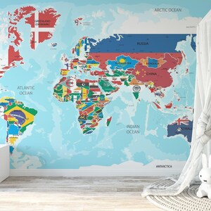 World map wallpaper with a colorful country flag design. This easy-to-apply, removable mural brightens up any space.