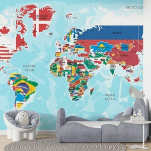 Removable wallpaper displaying a political world map with detailed country flags. A renter-friendly peel and stick wall covering.