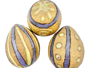 Handcrafted Clay Easter Eggs Set Of 3 Tan with Yellow and Purple Designs