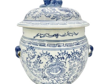 Topper vintage en céramique avec couvercle bleu et blanc, motif floral et figurine animale