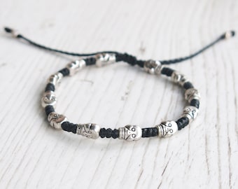 DEADHEAD - knotted bracelet with Skull beads and adjustable sliding knot for closure.