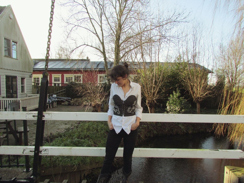 Eden Hand embroidered black denim bustier size S vintage look.