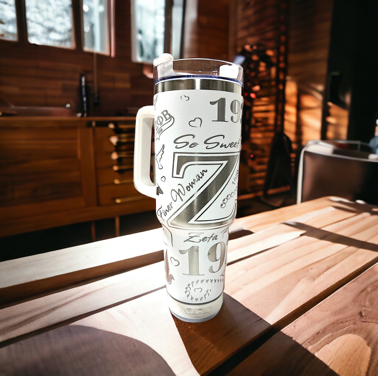 BACK IN STOCK! 40oz Laser Engraved Zeta Phi Beta Tumbler with Bluetooth Speaker, comes with charger, lid, and straw