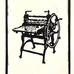 May include: Black and white linocut print of a vintage printing press with a large wheel. The print is signed "SH" and numbered "AP4".