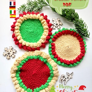 May include: Three handmade crochet coasters in red, green, and beige, arranged on a white surface. The coasters have a circular design with textured edges. The image includes a sprig of greenery, wooden snowflakes, and the text "Merry Christmas". A speech bubble says "Crochet Pattern PDF".