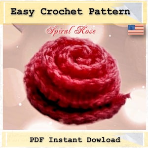 May include: A close-up of a red crocheted spiral rose. The rose is made with yarn and is a crochet pattern. The image has the text "Easy Crochet Pattern" and "Spiral Rose" on it. The image also has a US flag in the top right corner.