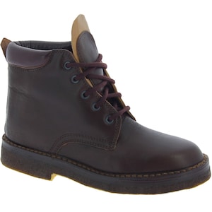 Handcrafted women's ankle boots in dark brown vegetable tanned leather | L'artigiano Florence