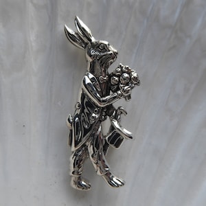 Silver Novelty Mr Rabbit Holing Flowers Brooch