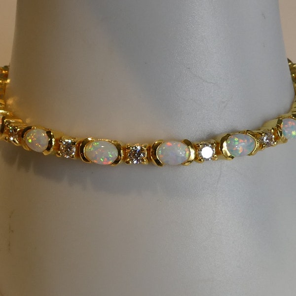 Stunning Silver 18ct gold Opal Line Bracelet