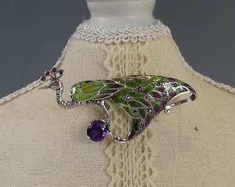 Broche de pavo real con rubíes y amatistas engastados en plata plique-à-jour