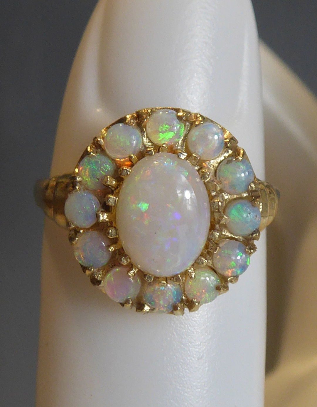 Opal and diamond cluster ring in 9ct gold