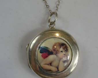 Medallón de querubín de plata fina esmaltada