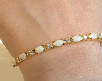 Stunning Silver 18ct gold Opal Line Bracelet