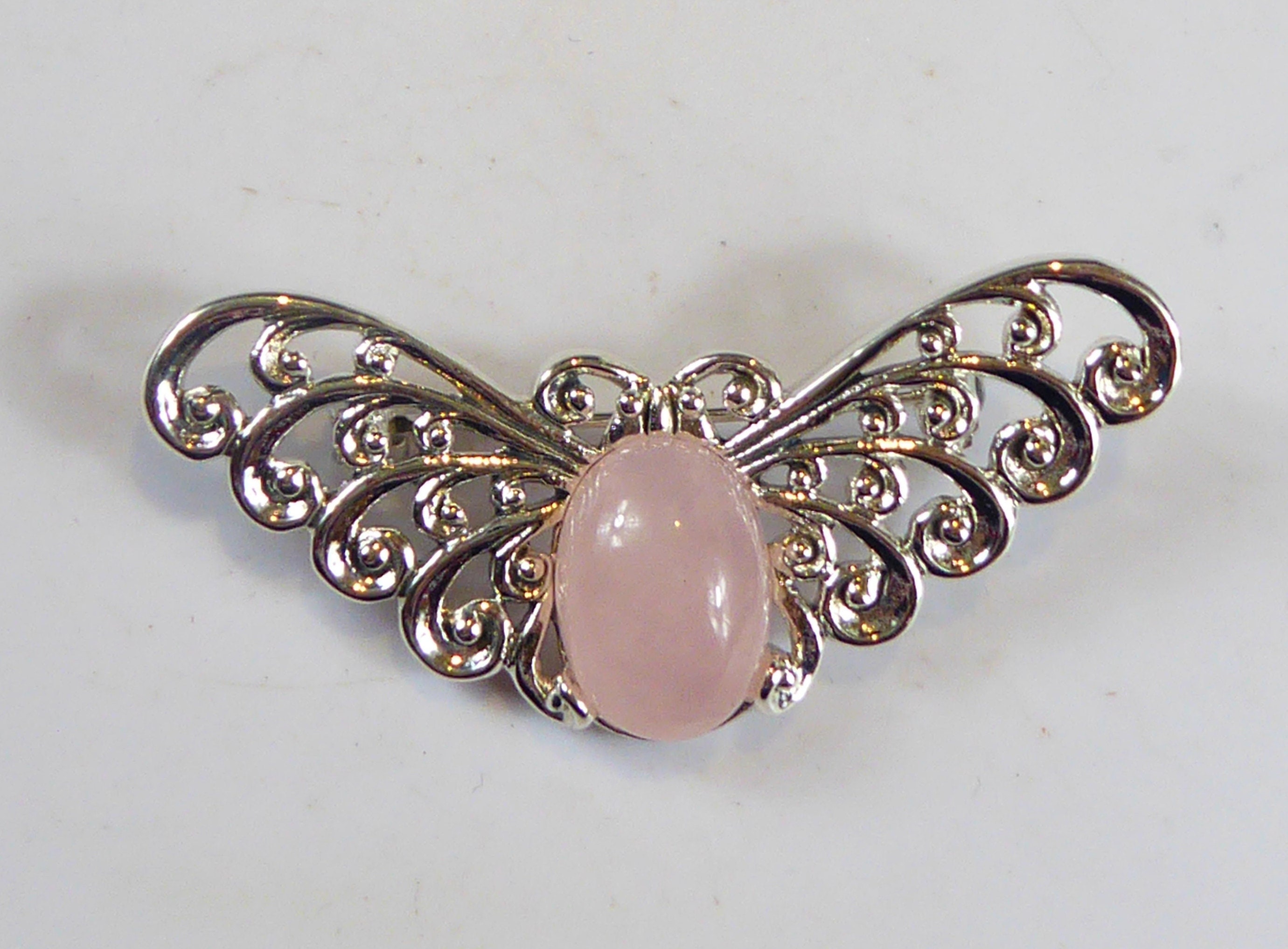 Broche en forme de feuille superposée en strass fuchsia et