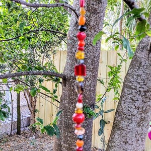 All Bead Suncatcher with shades of fire - red, orange, tan, brown - approx 11&quot; long