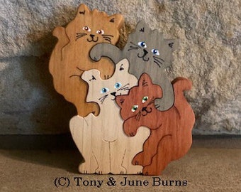 4 Cats Art puzzle , simple but beautiful ,4 piece design aprox size 3 3/4" x 3" x 1"