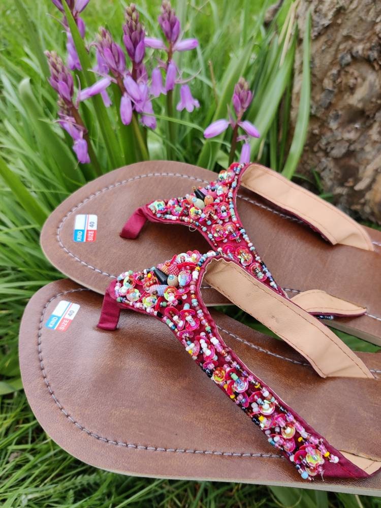 Red sparkle hotsell flip flops