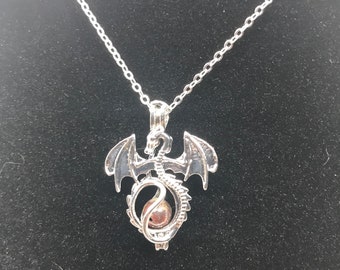 Platinum Cage Dragon with Dragons Blood bead,  Unisexual